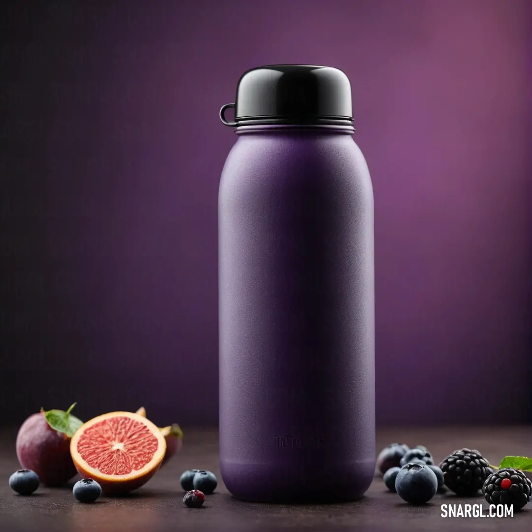 A striking purple water bottle positioned beside freshly cut grapefruit and plump blackberries, all set on a table adorned with a playful purple background, presenting a vivid CMYK 65,100,5,40 color example.