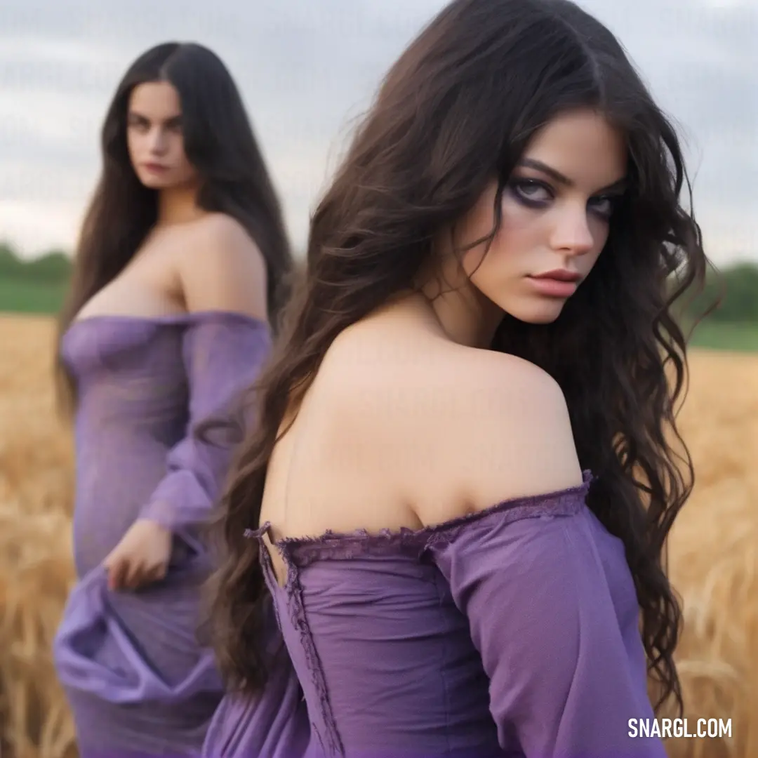 Woman in a purple dress standing in a field of wheat with her hair blowing in the wind and her eyes closed. Example of PANTONE 2725 color.