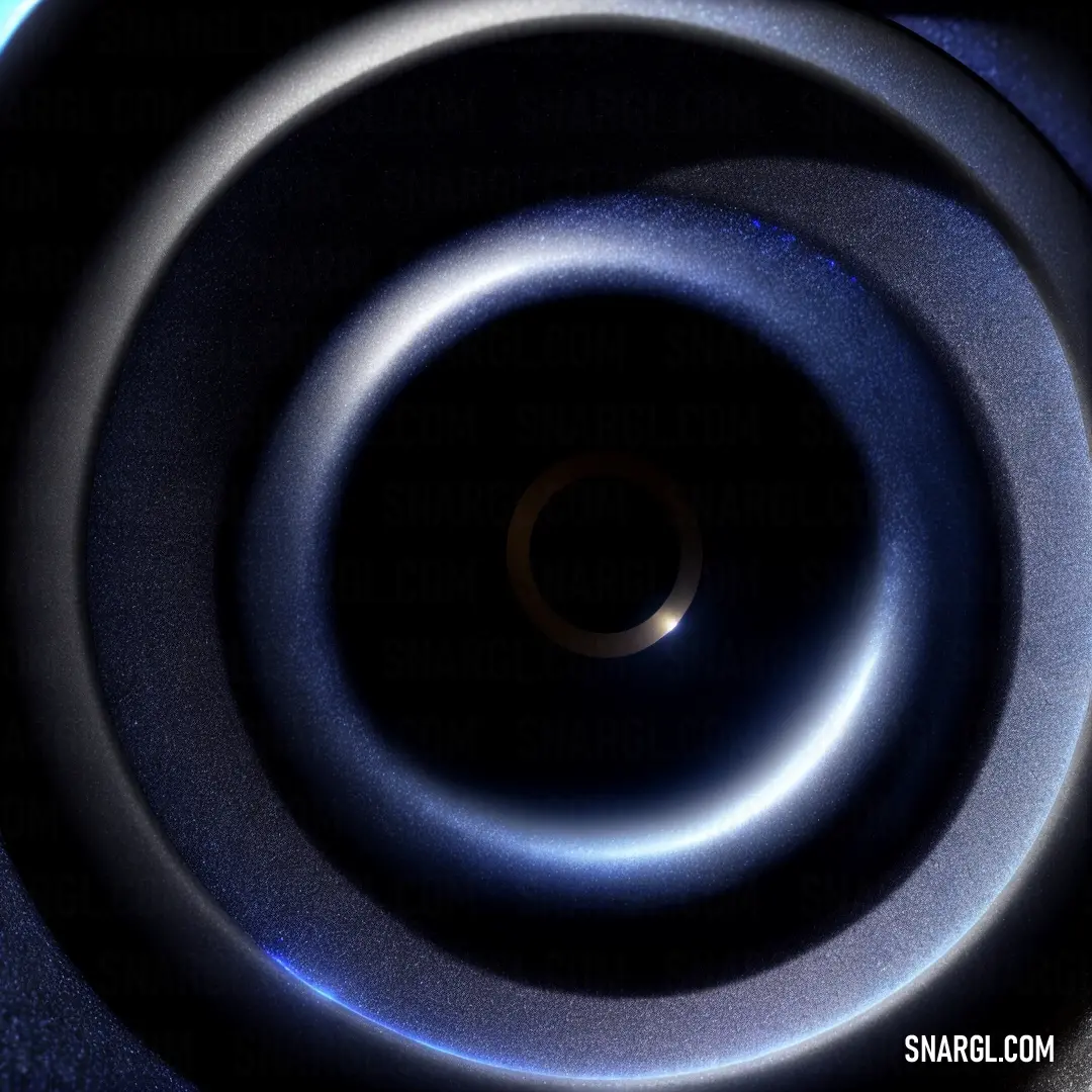 Black and blue circular object with a black background. Example of #302D63 color.