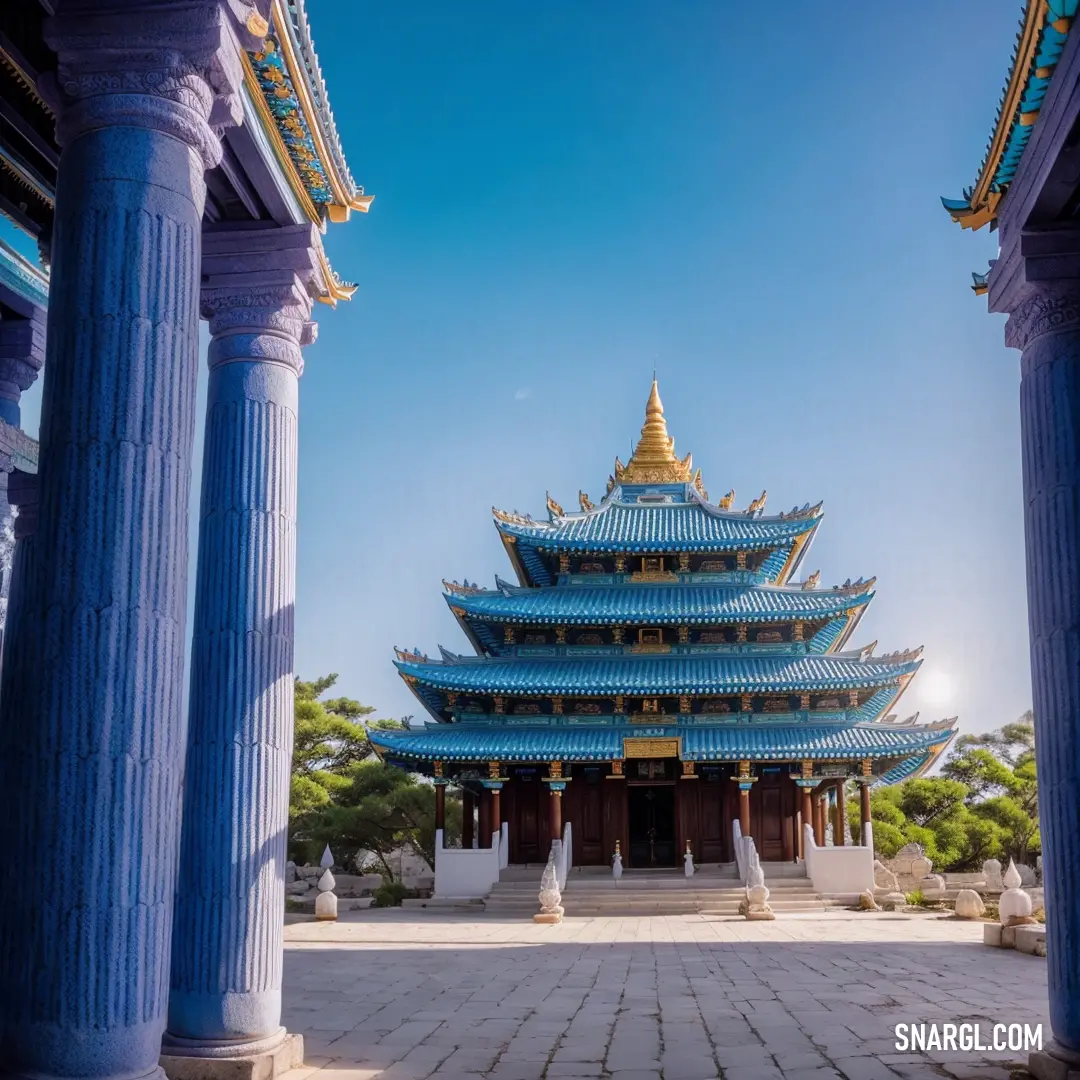 Blue building with columns and a sky background. Example of #282A55 color.