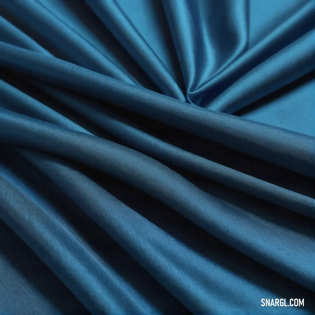 A stunning blue fabric, delicately adorned with a subtle thin line along its edge, captures the eye with its elegance and versatility. Its vibrant shade is reminiscent of a clear sky, bringing a touch of freshness to any setting.