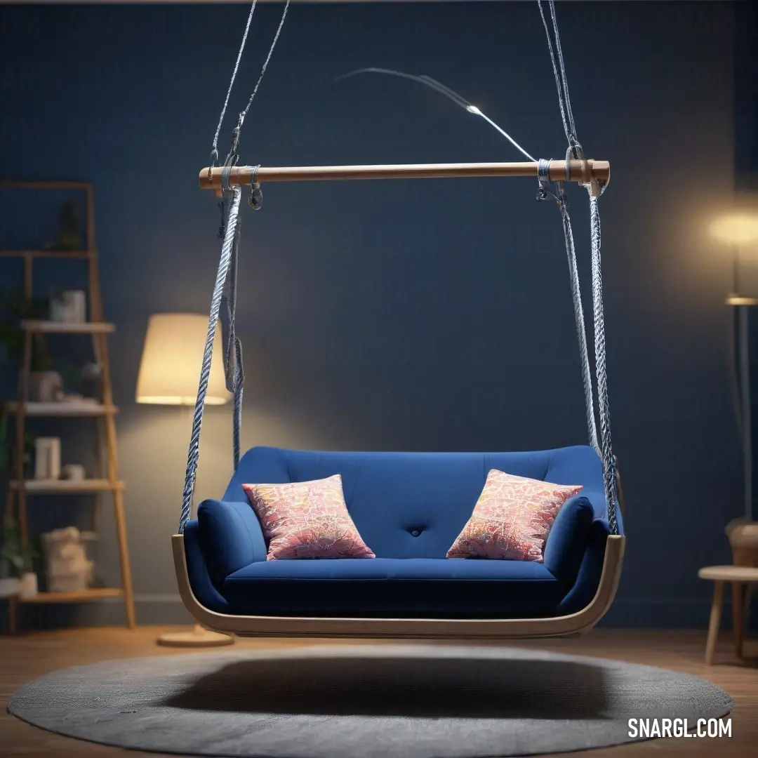 A cozy blue swing chair adorned with plush pillows invites relaxation in a beautifully styled living room, featuring a plush rug and a chic lamp casting warm light, creating a serene retreat for reading or enjoying company.