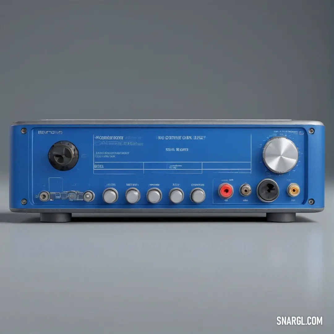 A stylish blue and silver radio receiver sits on a table, with various buttons and knobs on its side. The sleek design contrasts with the simple background, and its cool, sophisticated color scheme adds to the allure.