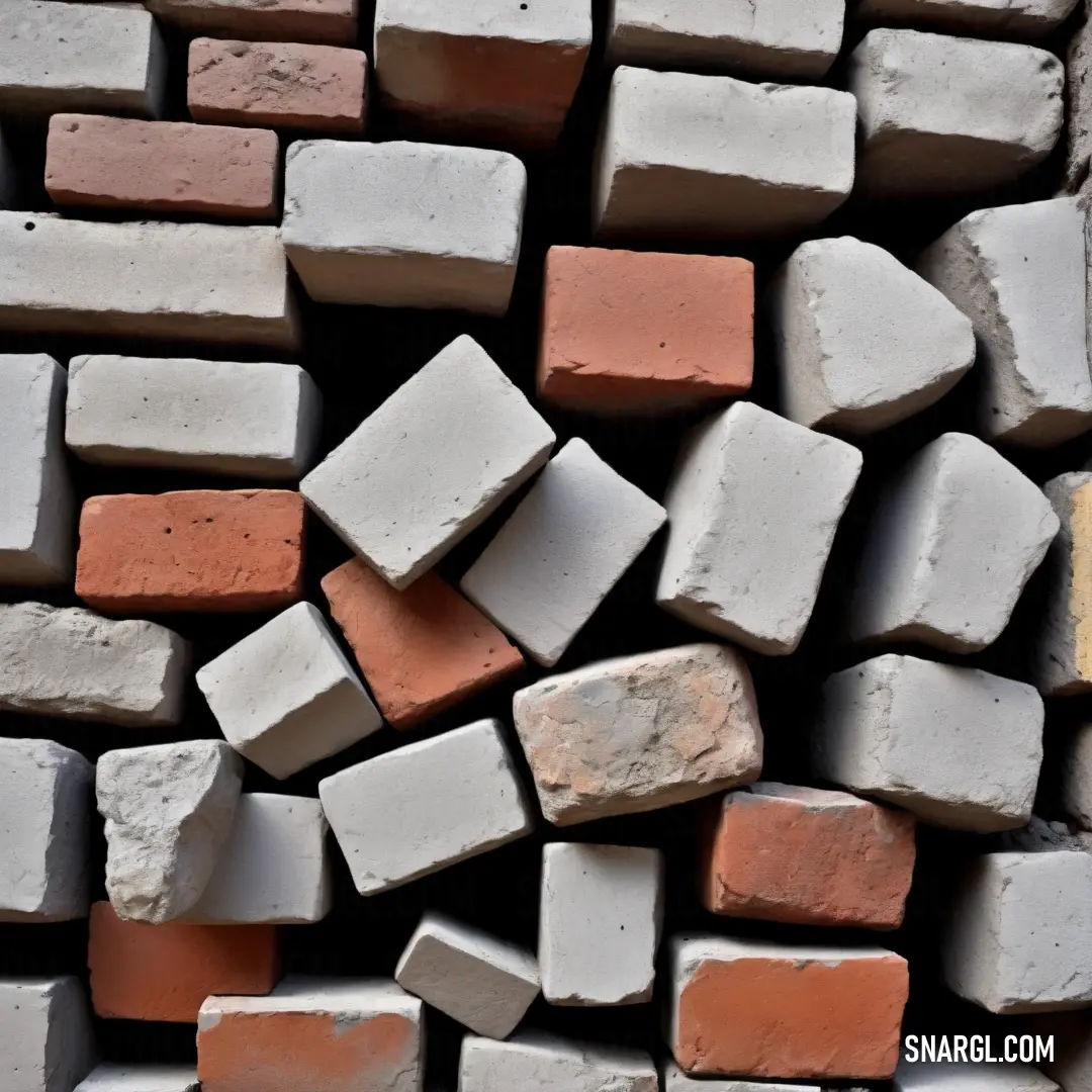 A striking composition of a pile of bricks placed on a cement block tabletop, with a single yellow brick standing out in the center, creating a strong focal point. The surrounding elements are captured with a PANTONE 3375 green hue.