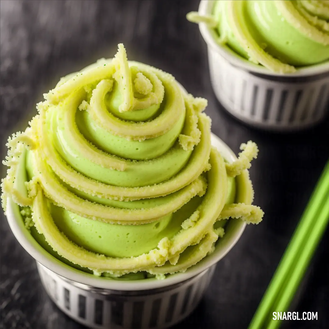 Close up of a bowl of food with green frosting on top of it. Example of PANTONE 375 color.