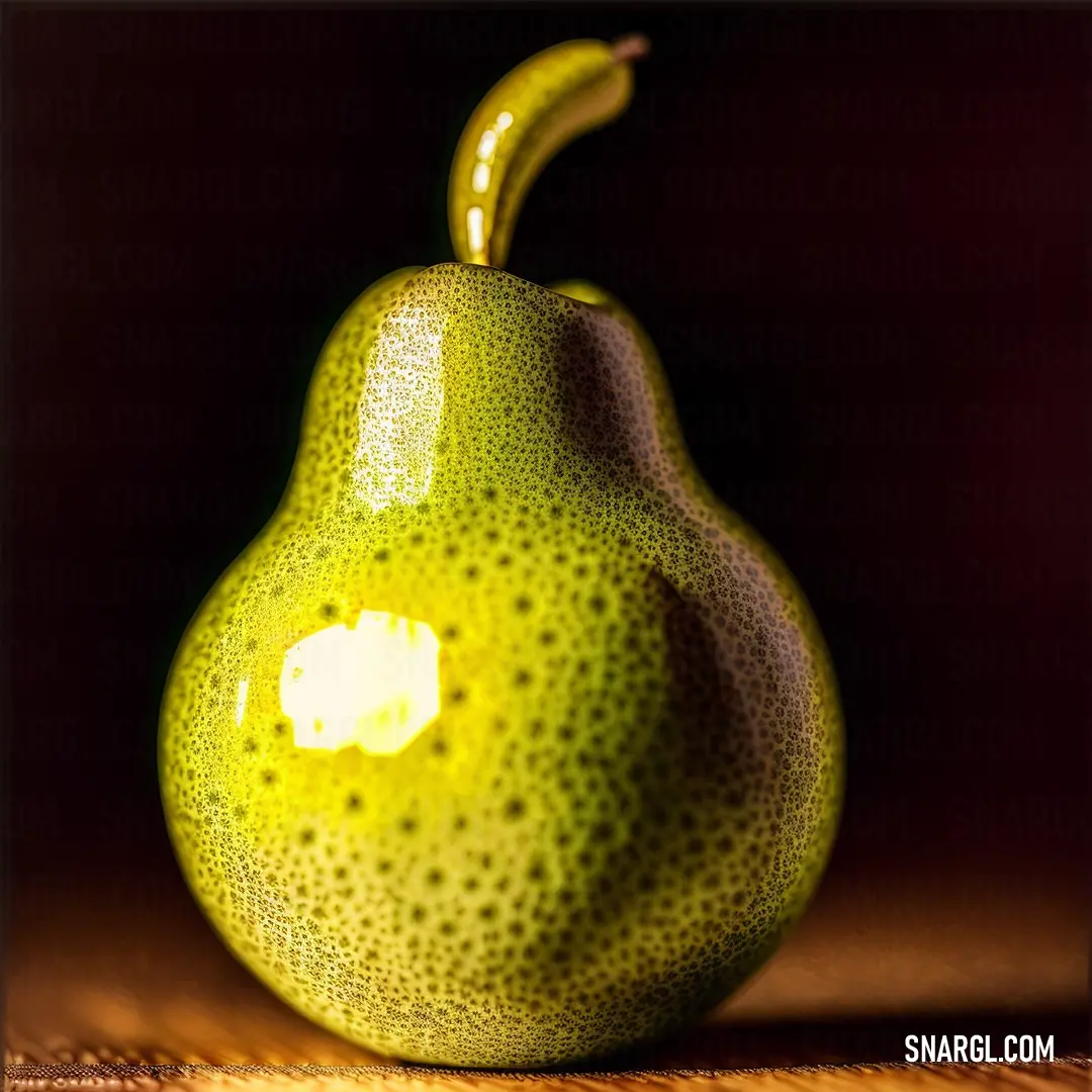 PANTONE 382 color. Pear with a yellow spot on it's face on a table top with a dark background