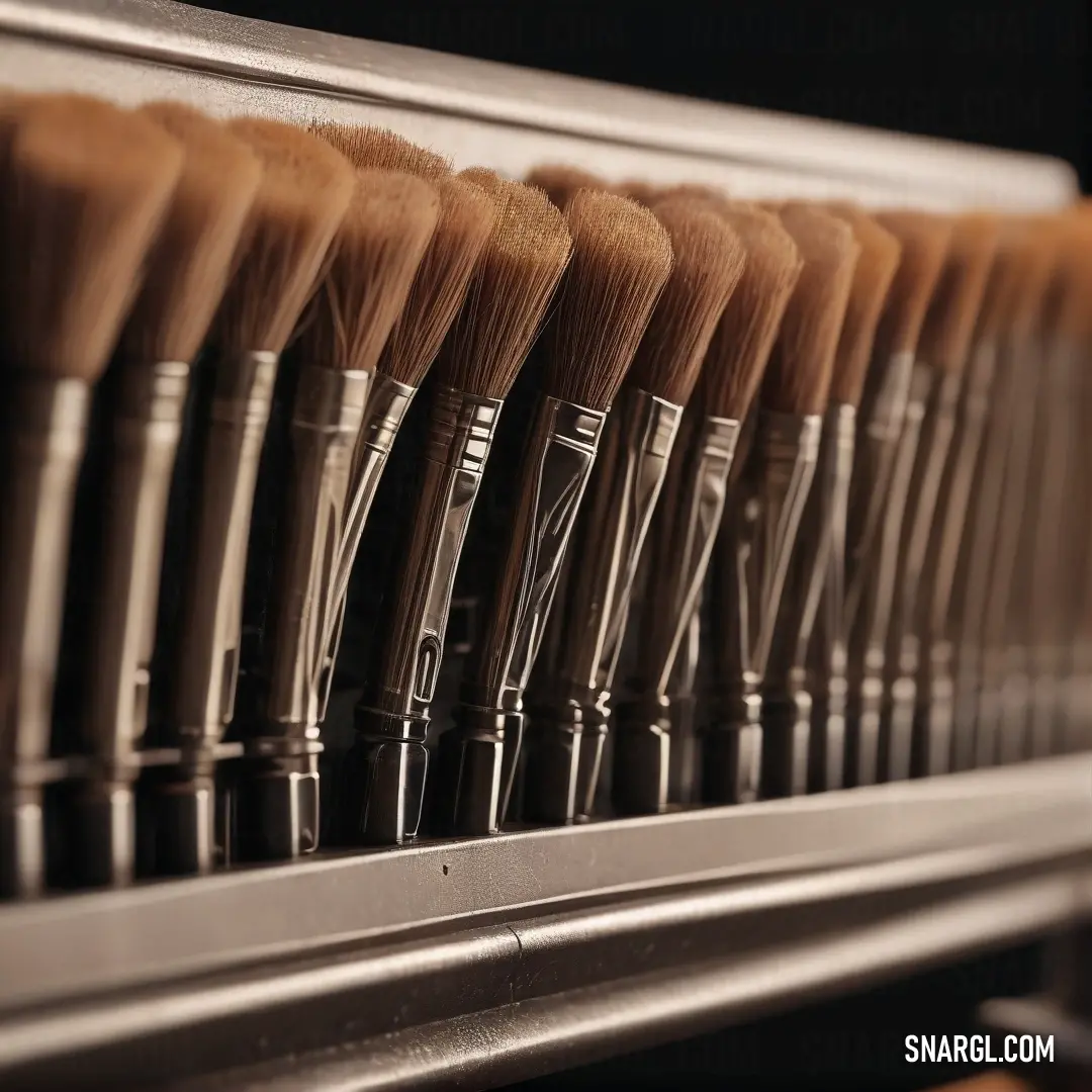 A neat row of brushes rests on a metal shelf in a well-organized store, showcasing a variety of sizes. The color of the brushes is warm, with earthy tones blending into the metal’s cool hue.