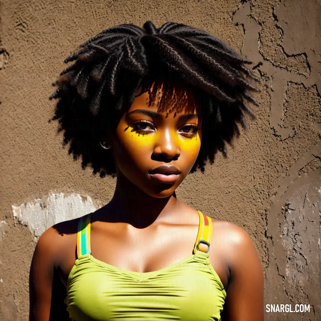 Woman with yellow and green makeup and a yellow top on her head and a yellow. Color #EDDF8C.