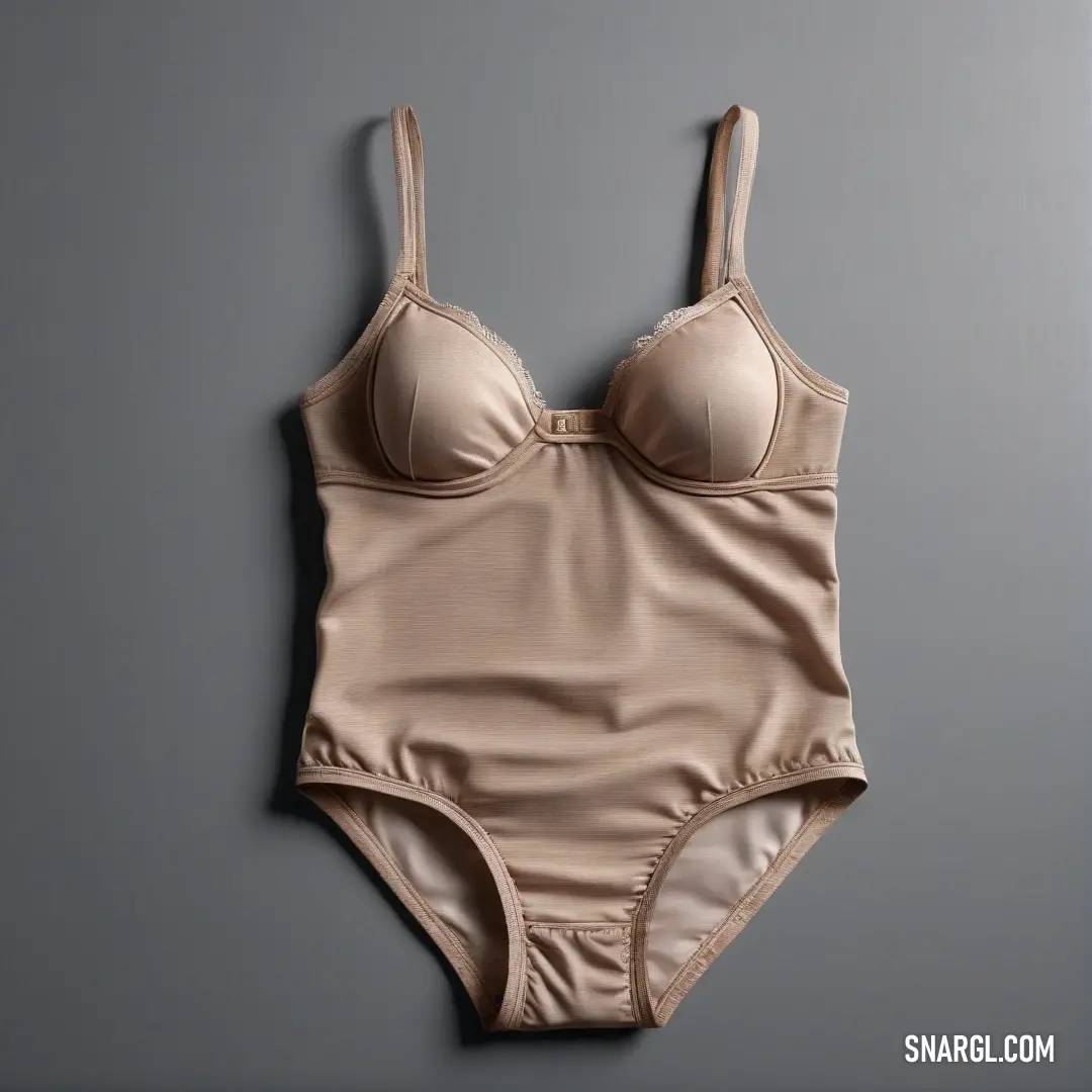 PANTONE 4665 color example: Woman's tan bra with a high neck and straps on a gray background
