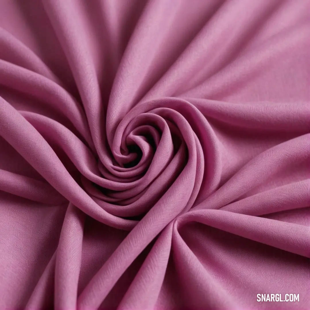 A beautifully captured close-up of a pink fabric, featuring a refined circular design at its center, revealed in the soft sunlight of color RGB 222,203,153, exuding charm and warmth.