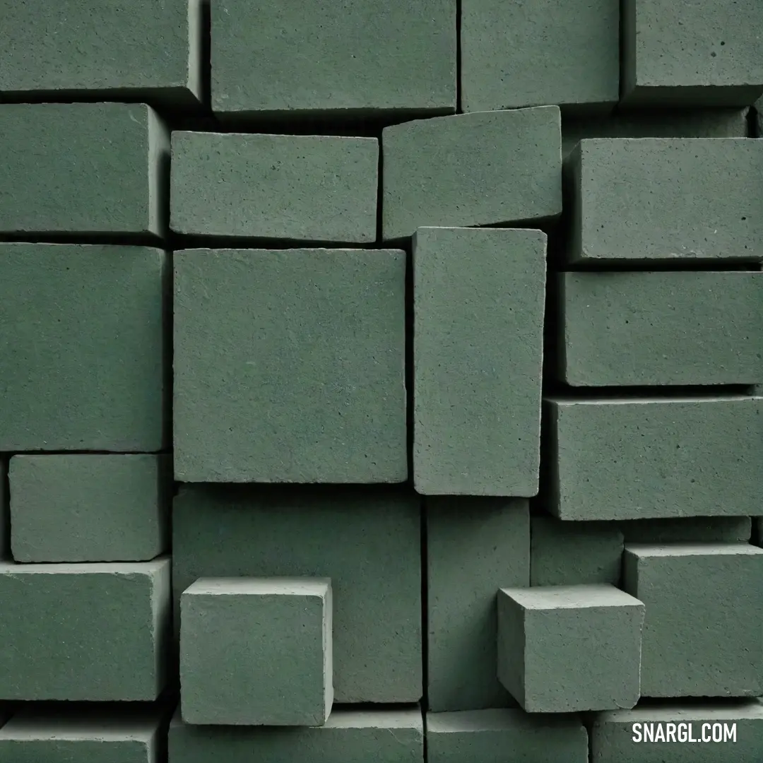 A striking arrangement of green cement blocks stacked together, forming a rugged yet appealing structure. The RGB 108,138,120 tones reflect nature's resilience, showcasing a strong aesthetic of earthiness and durability.