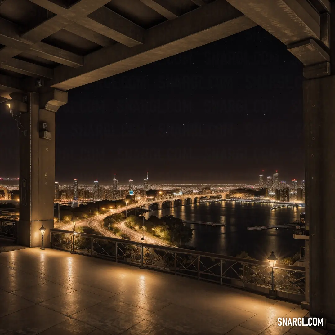 A breathtaking night view from a balcony, with sparkling city lights reflecting off a winding river. The walkway is illuminated, leading into the darkness, while the surrounding buildings create a stunning contrast against the night sky.