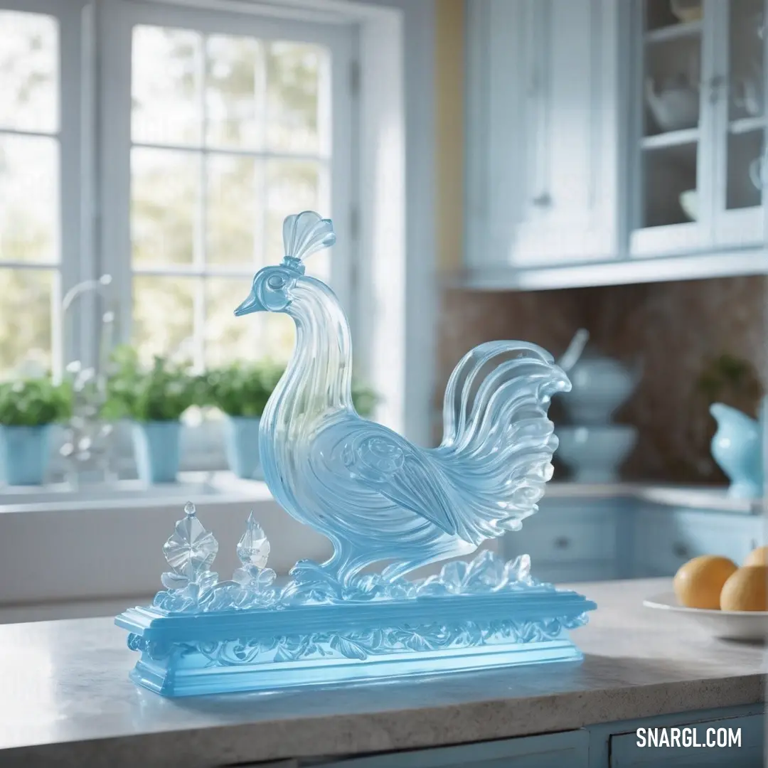 Glass rooster figurine on a kitchen countertop in front of a window with potted plants. Color RGB 135,203,216.