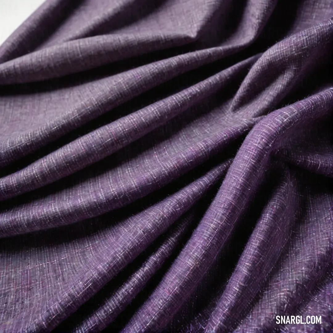 Purple fabric with a white background. Example of CMYK 70,77,7,23 color.