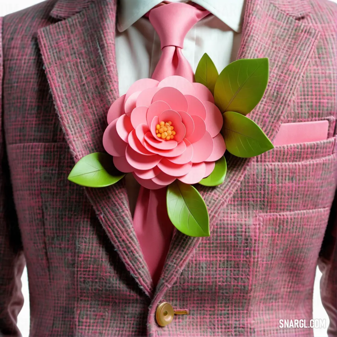 Pink suit with a pink flower on the lapel of it. Color CMYK 8,60,21,24.