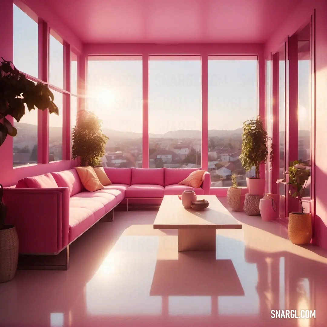 Living room with a pink couch and a table in it with a view of the city outside the window. Example of PANTONE 702 color.