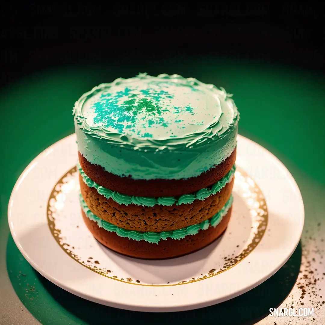 Three layer cake with green frosting on a plate on a table with a green tablecloth and a gold rim. Color RGB 81,177,124.