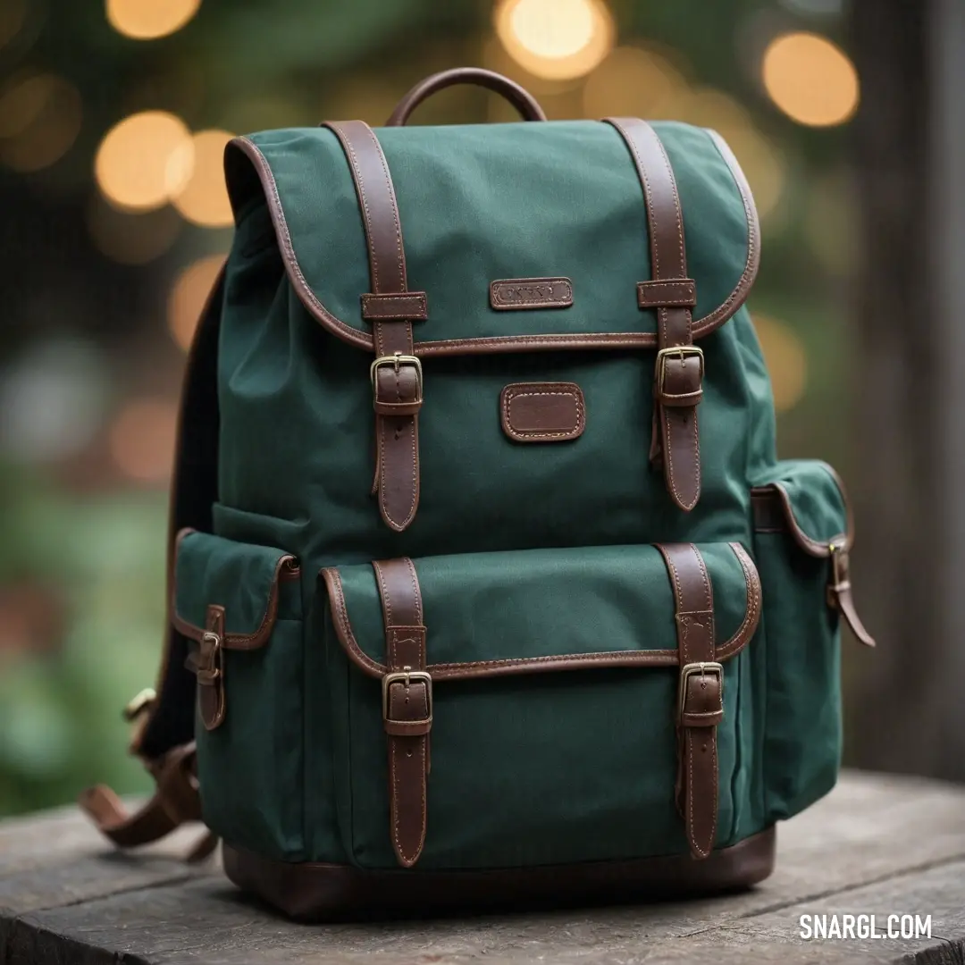 A green backpack is elegantly placed on a wooden table under the shimmering lights of a nearby tree, presenting a blend of nature and style that captivates the eye.