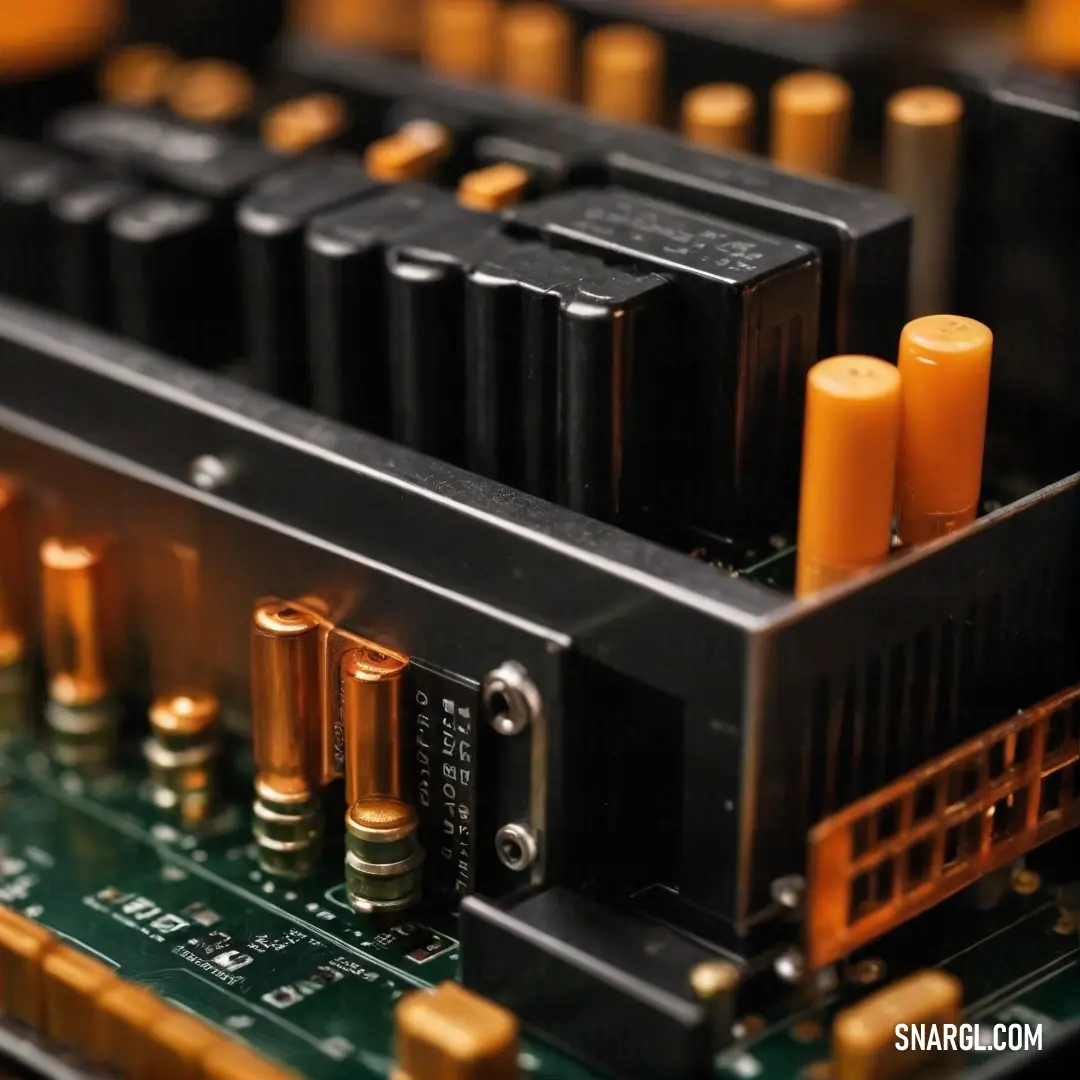 An intricate close-up view of a motherboard bursting with batteries, showcasing an array of electronic components. A few vibrant orange batteries stand out atop the circuit, drawing attention to the complex engineering of the device.