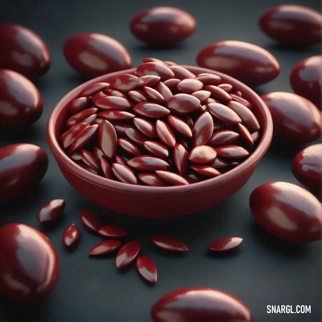 A captivating bowl filled with vibrant red seeds rests atop a sleek black surface. Surrounding petals of deep red enrich the scene, creating a striking visual feast that invites curiosity and appreciation of nature's colors.