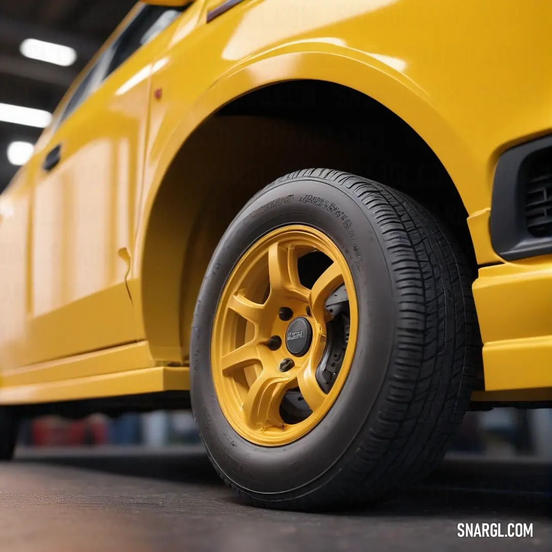 A striking close-up capturing the rich details of a yellow car tire mounted on a vehicle, set against a well-lit garage floor that contrasts with the black flooring and white ceiling, evoking a sense of automotive charm.