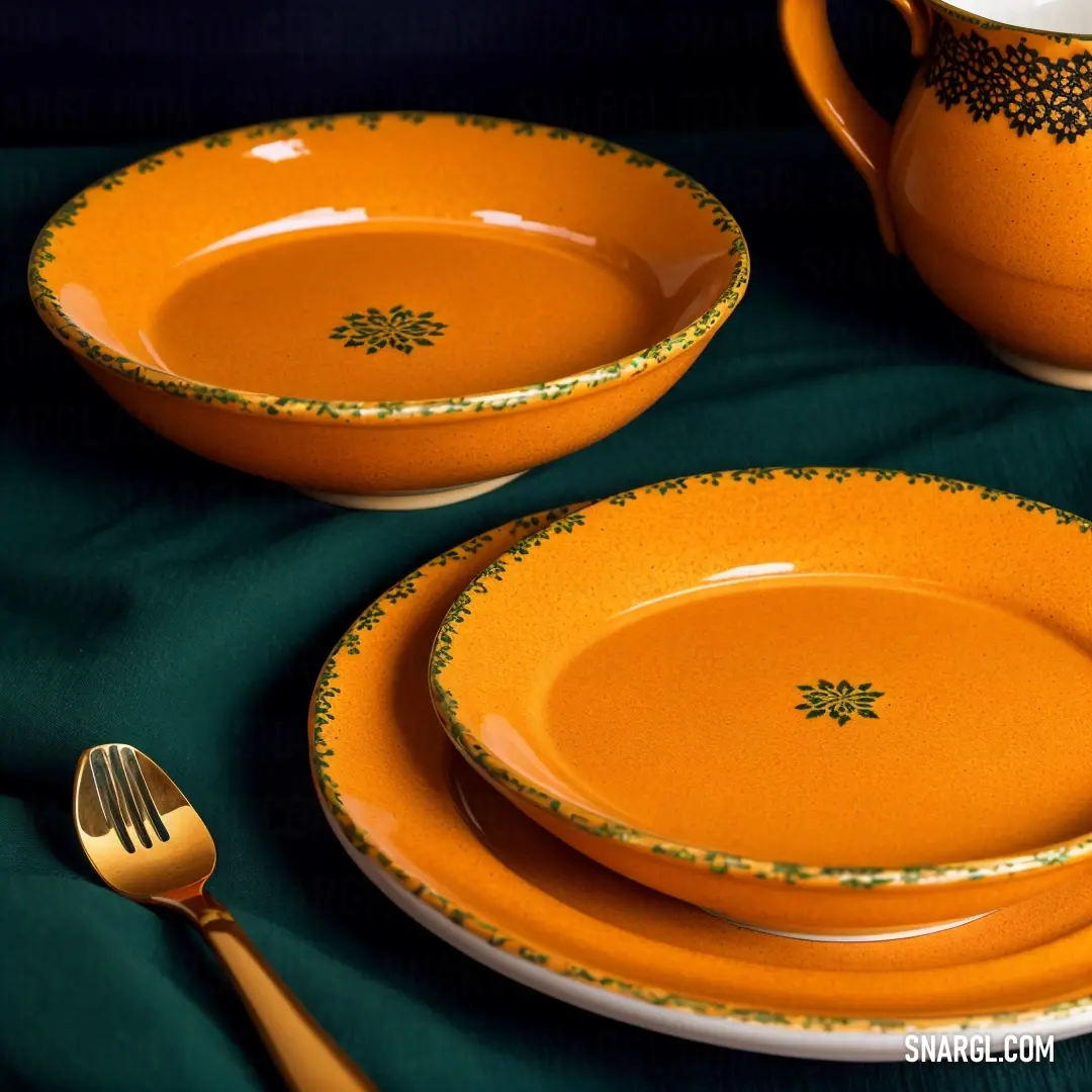 Table set with a yellow and green dinnerware and a green table cloth with a green table cloth. Color PANTONE 7571.