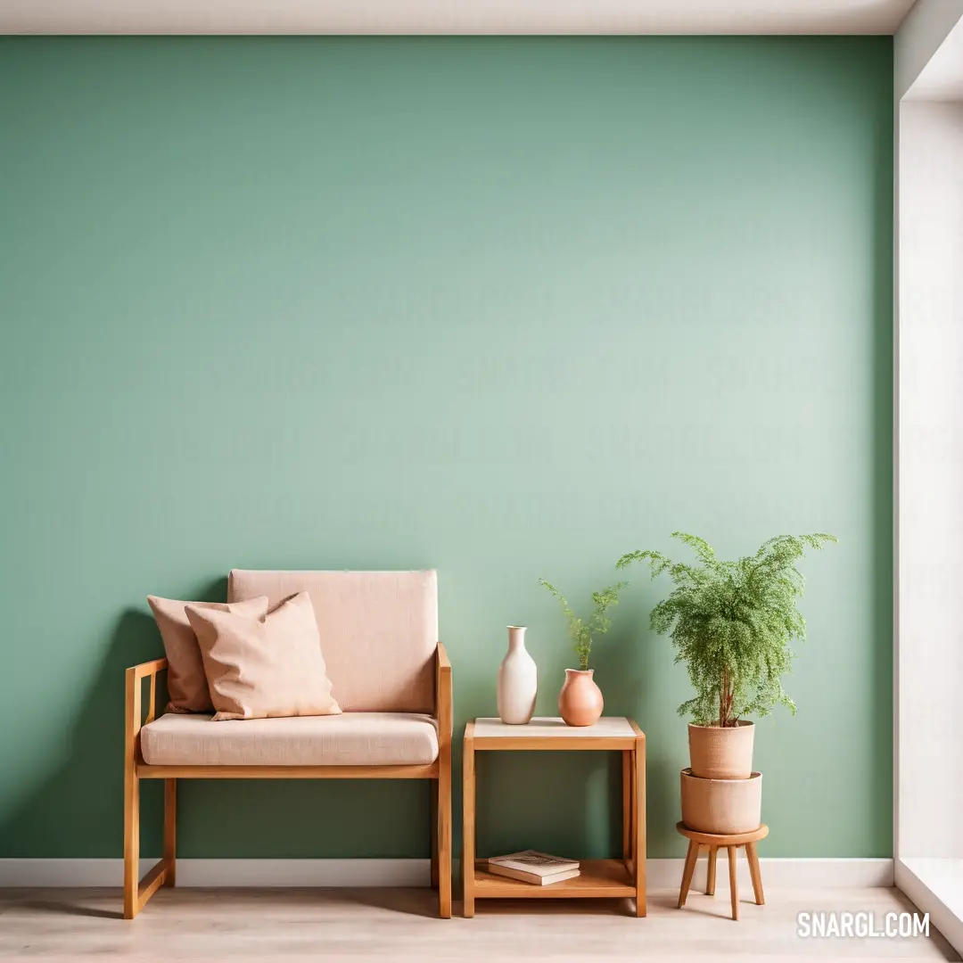 PANTONE 7611 color. Chair and a table with a plant in it against a green wall with a window