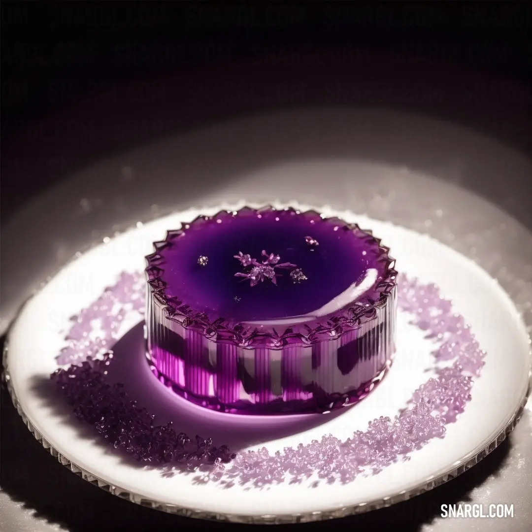 Purple cake on a white plate on a table with a black background. Example of PANTONE 7658 color.