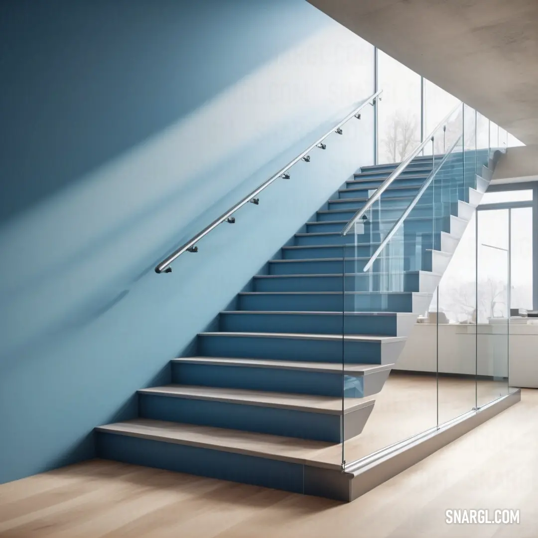 Blue staircase with glass railing and railing rail on the side of it and a window in the background. Example of CMYK 56,9,9,21 color.