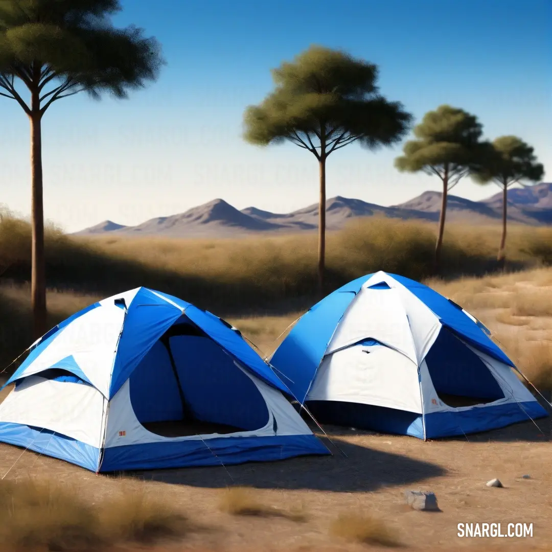 An expansive desert landscape featuring two tents set against a backdrop of lush trees, embodying the spirit of adventure and serenity while showcasing the enchanting hues of PANTONE Process Blue in the sky.