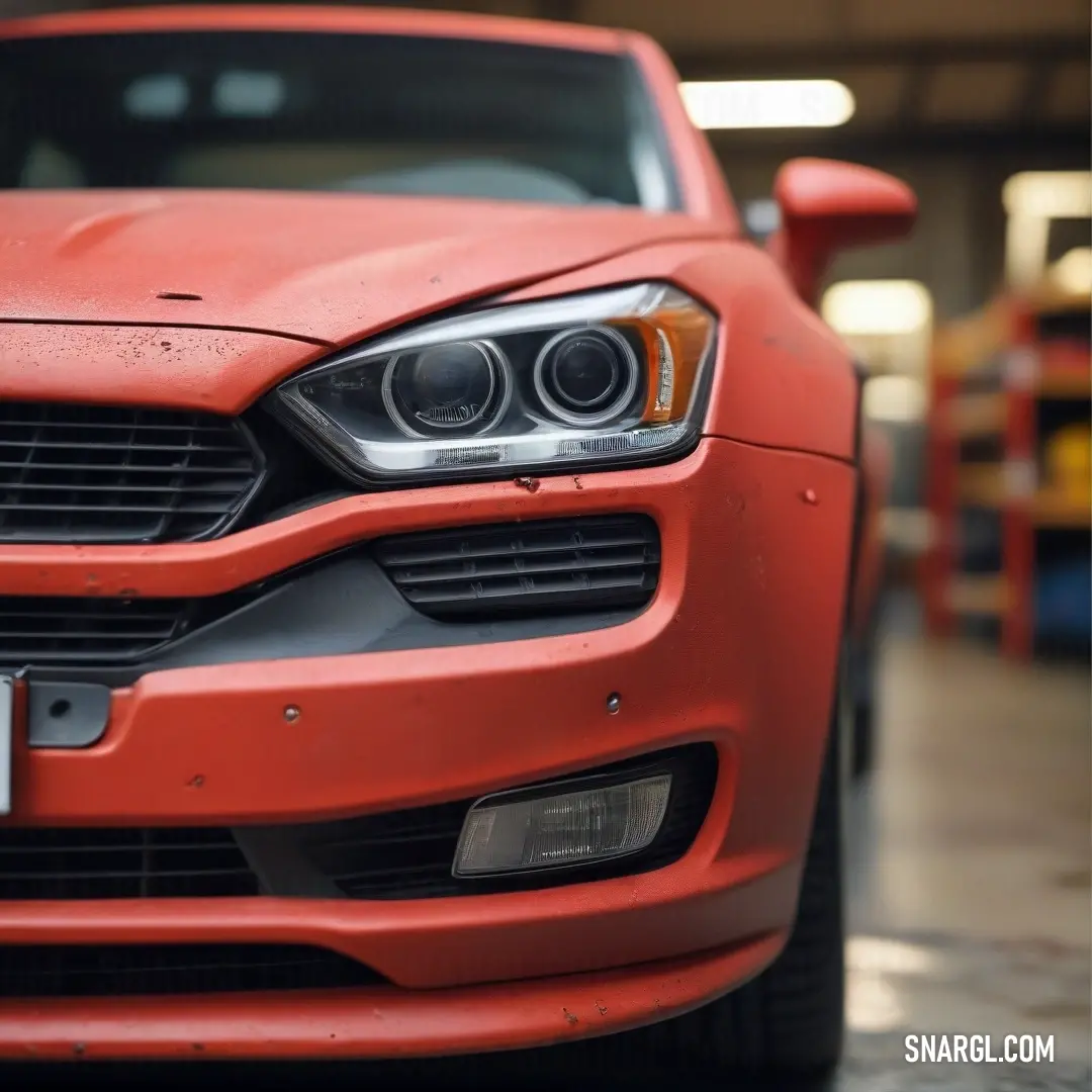 A bright red car is parked in a cozy garage, surrounded by boxes that tell the story of everyday life. The space exudes warmth and familiarity, reflecting the essence of home and the joys of vehicle ownership.