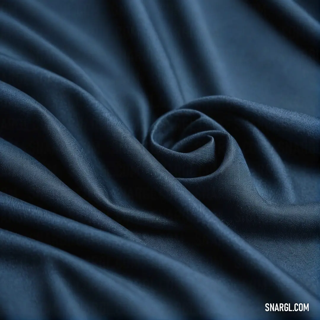 Gaze at an exquisite blue fabric adorned with a subtle yet fascinating thin line, elegantly displayed against a deep blue background. This striking visual presents an impressive representation of PANTONE Violet, capturing its sophisticated allure.