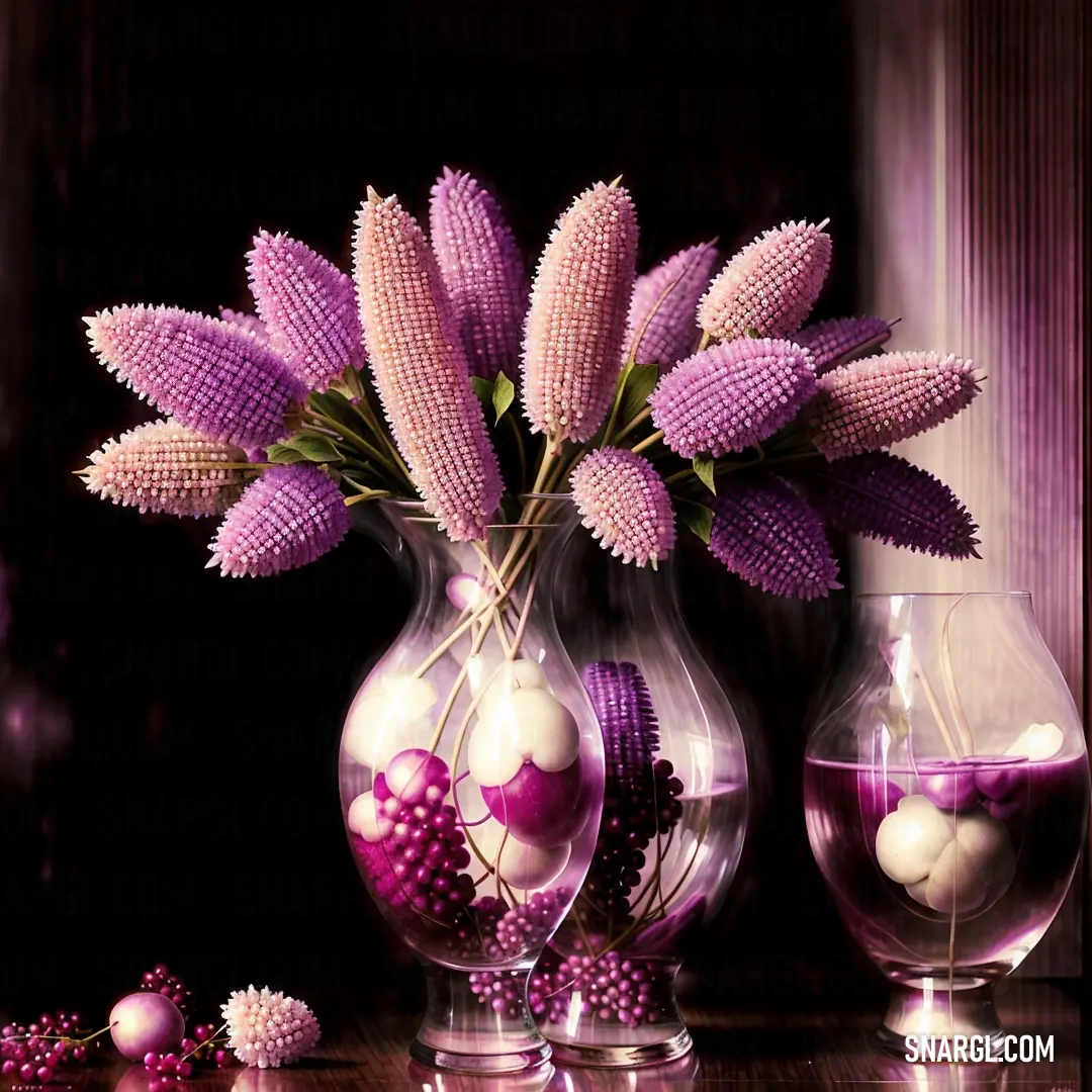 Vase filled with purple flowers and balls on a table next to other vases with balls in them
