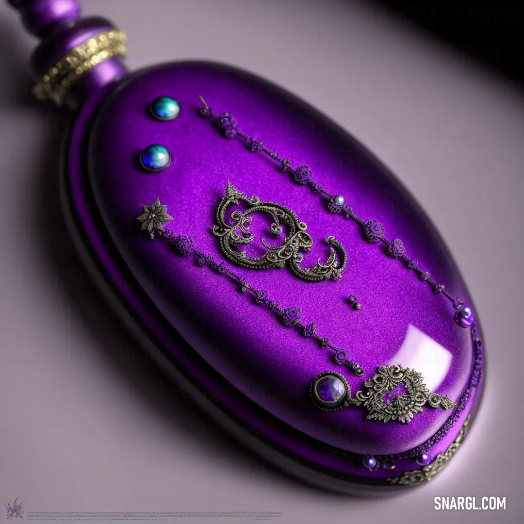 Purple necklace with a design on it and a chain around it on a table top with a purple background. Color Patriarch.