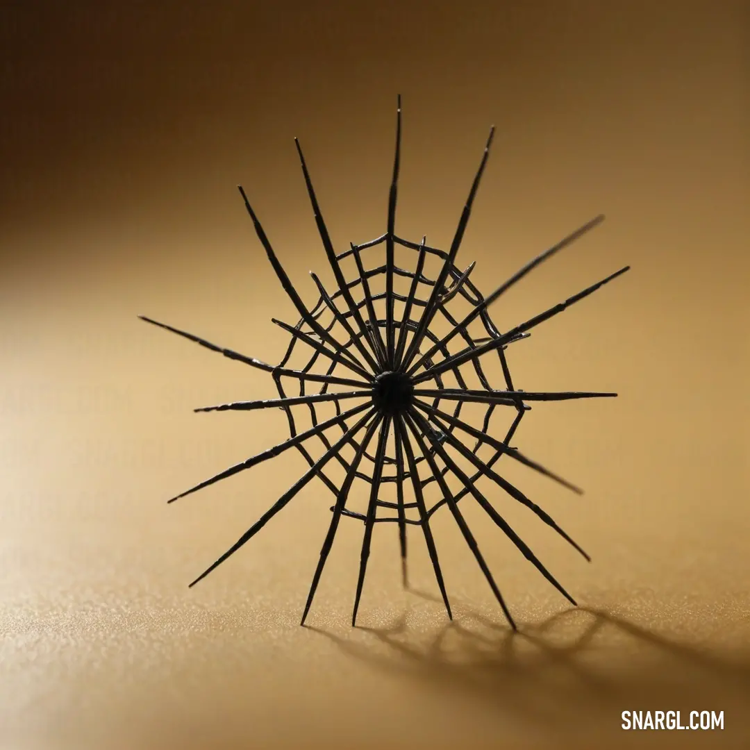 A close-up shot of a metal object on a table with a faint shadow of a plant stretching across the floor, all bathed in warm peach-orange light, casting a soft, inviting glow.