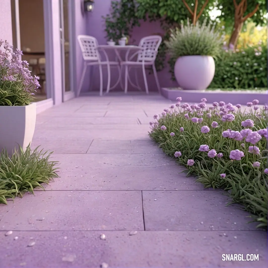 Patio with a table and chairs and flowers in the foreground. Color Periwinkle.