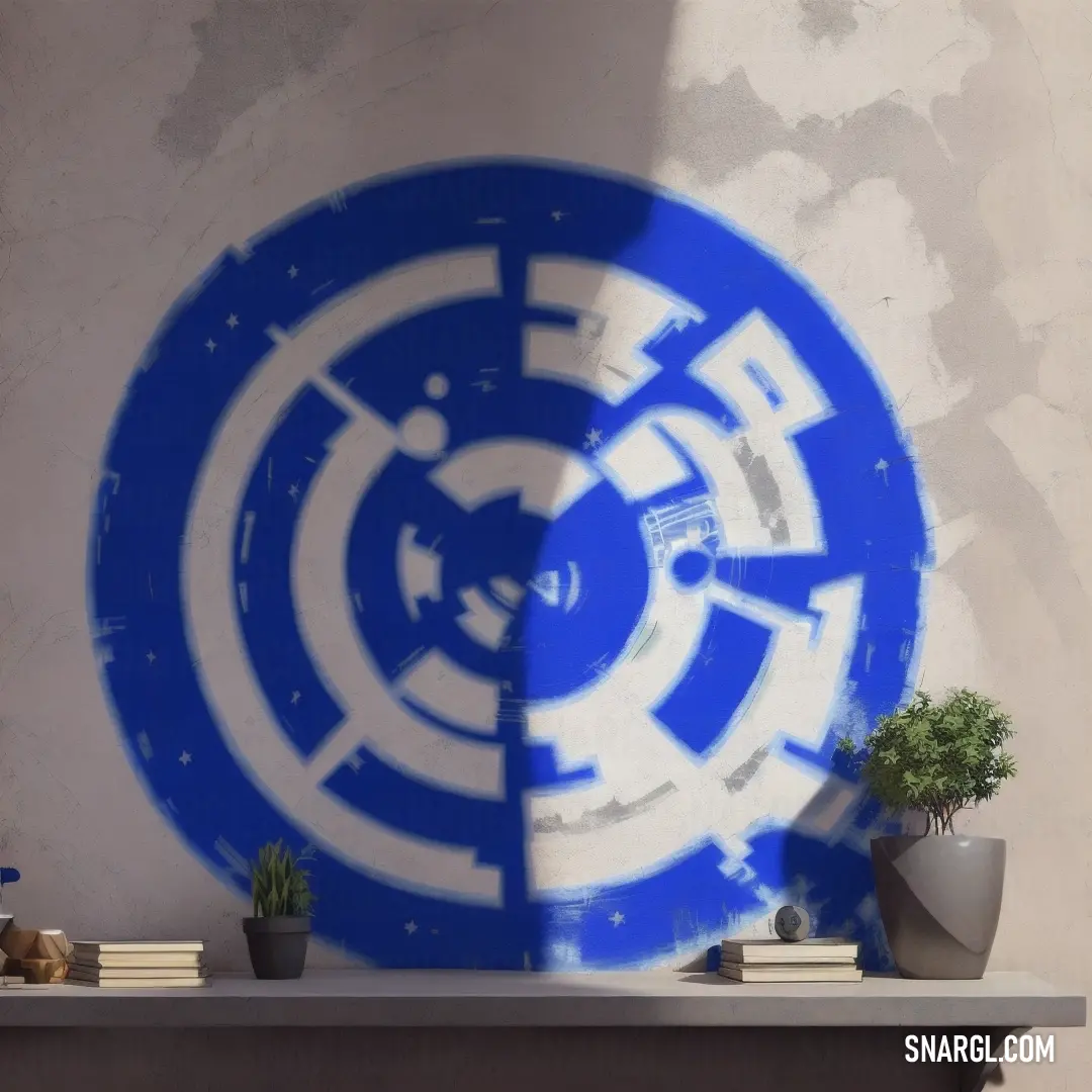 Blue and white circular design on a wall next to a potted plant and a book shelf with a teddy bear. Color #1C39BB.