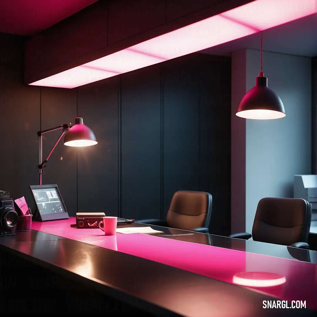 Desk with a laptop and a lamp on it in a room with black walls and a pink light. Color RGB 247,127,190.