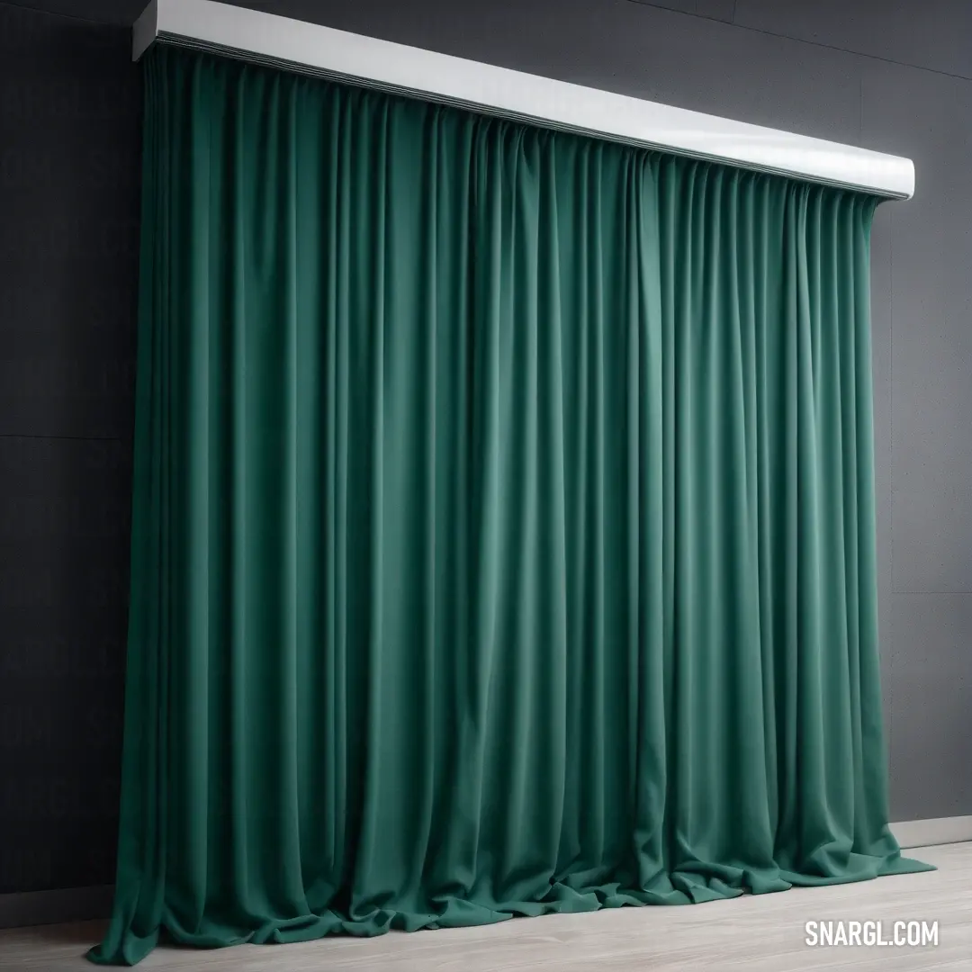 Green curtain is hanging on a wall in a room with a wooden floor and a white ceiling fan. Color CMYK 66,0,32,79.
