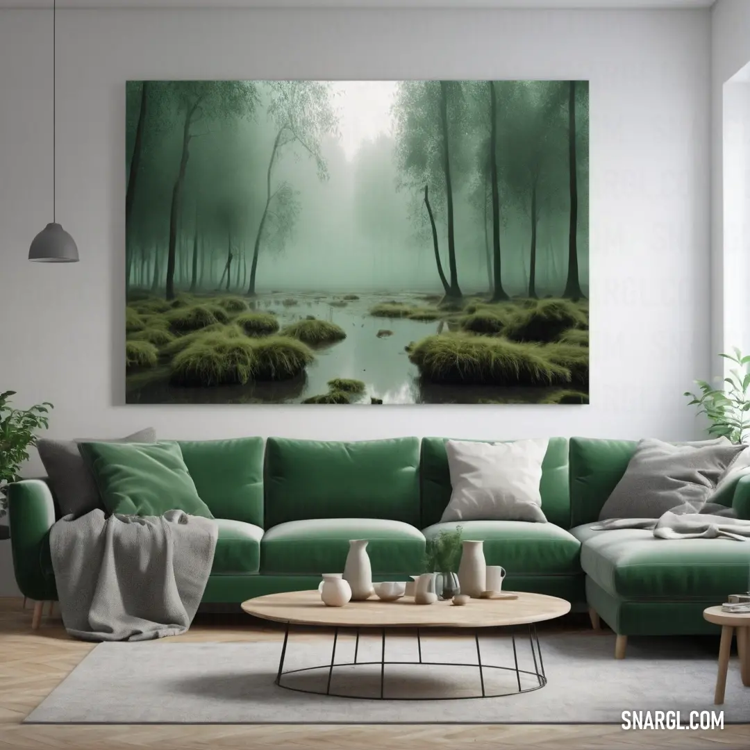 Living room with a green couch and a painting on the wall above it that has a river running through it. Example of Phthalo green color.