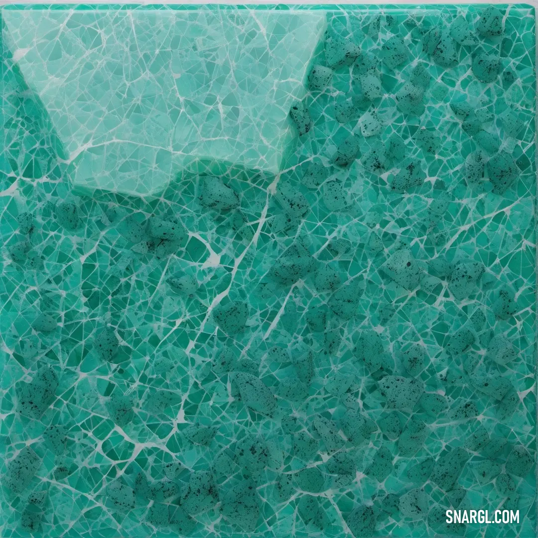 Pine green color. Green marble tile with a white border around it and a white border around it that has a green