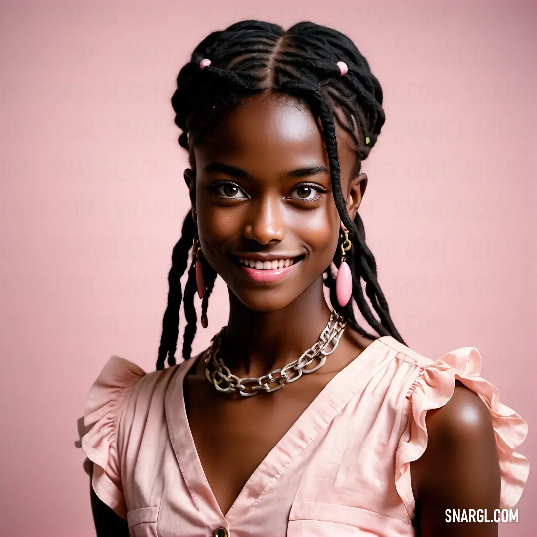 Woman with a pink shirt and a necklace on her neck. Example of RGB 255,192,203 color.