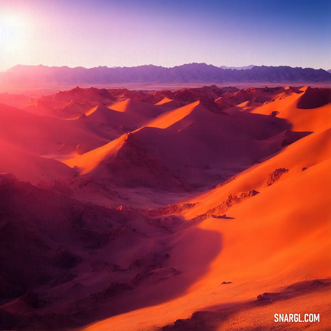 Desert landscape with a bright sun in the background and mountains in the distance