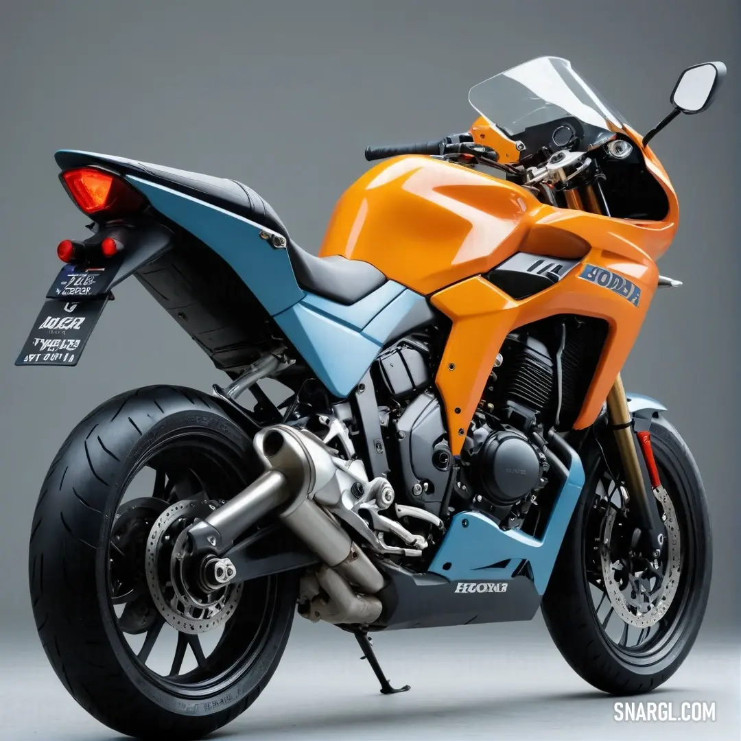 Motorcycle is shown in a studio shot with a gray background. Color RGB 255,143,0.