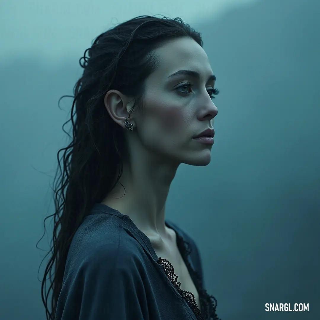 With flowing locks and a contemplative expression, the Prophetess of Avalon gazes into the misty abyss, dressed in a simple black shirt. The foggy background adds to her air of mystery, as if she's peering into another realm beyond the veil of reality.