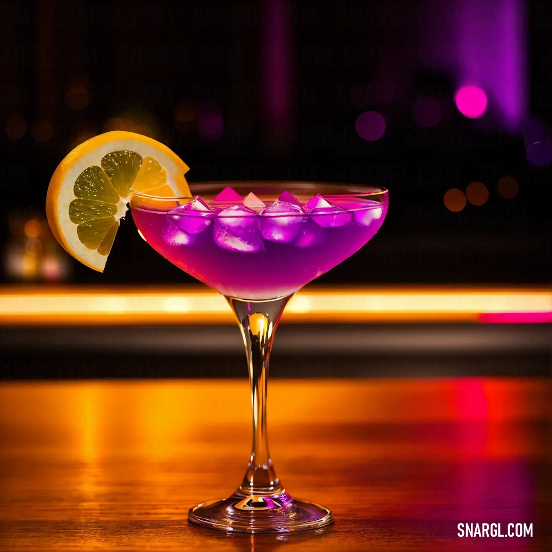 Purple drink with a lemon slice on the rim and a purple liquid in the glass