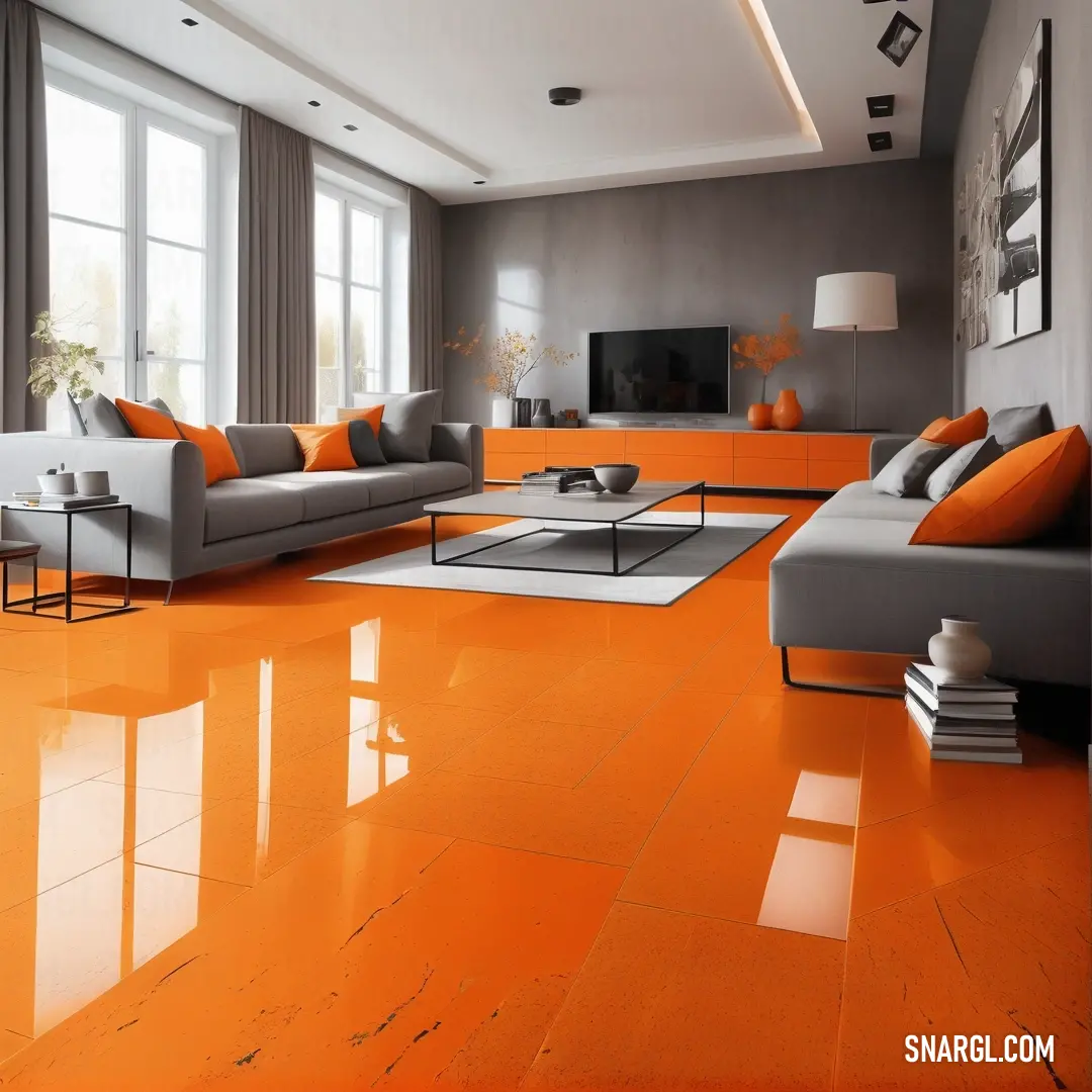 Living room with orange and gray furniture and a large window with a view of the city. Color CMYK 0,54,91,0.