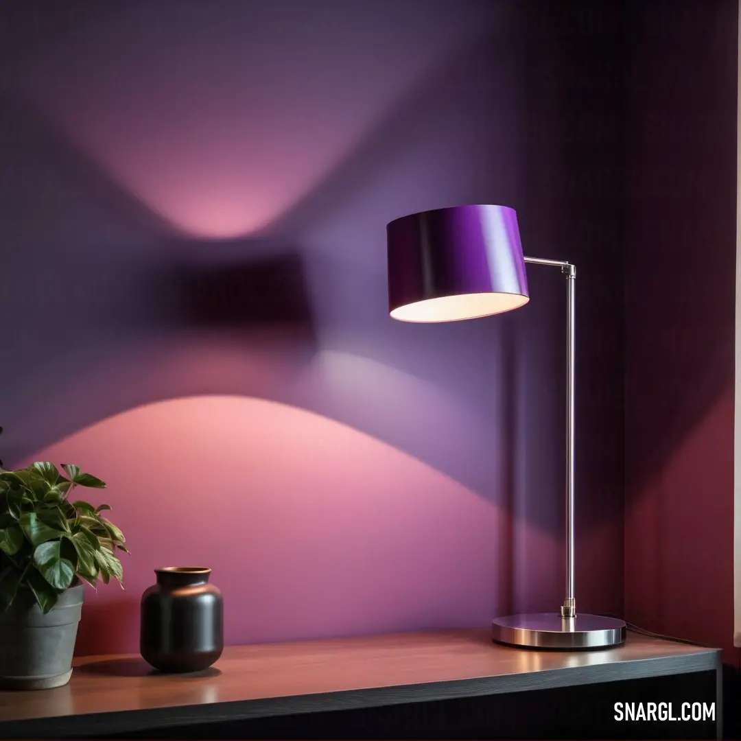 Lamp on a table next to a potted plant and a potted plant on a table in a room. Color CMYK 33,66,0,39.