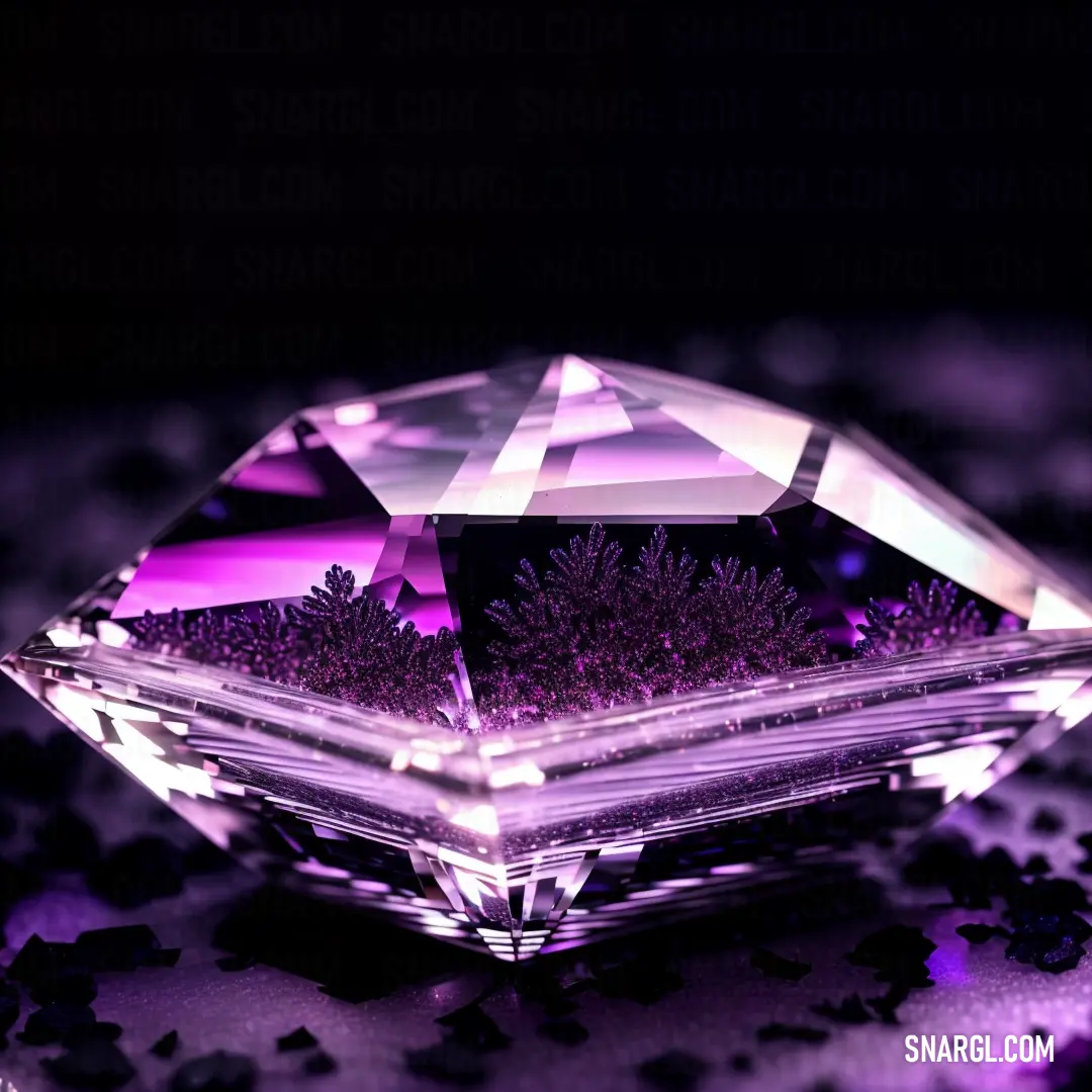 Purple diamond with a purple center surrounded by purple and black confetti pieces on a black background
