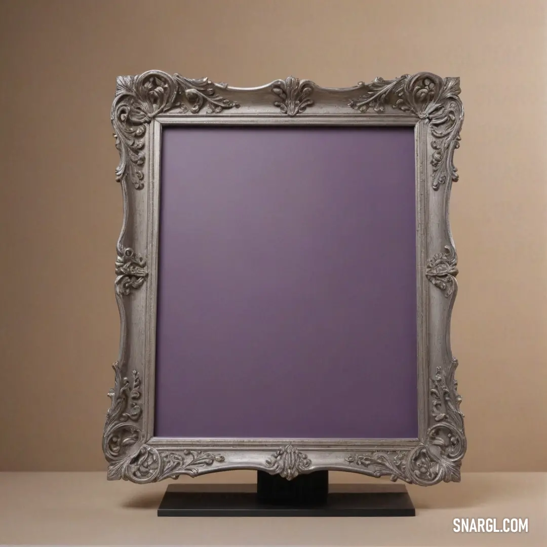 An artistic display of a silver frame contrasted strikingly against a rich purple background, creating a captivating visual appeal that draws the eye in.